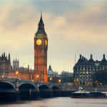 Big Ben during the evening, with a sunset in the background.